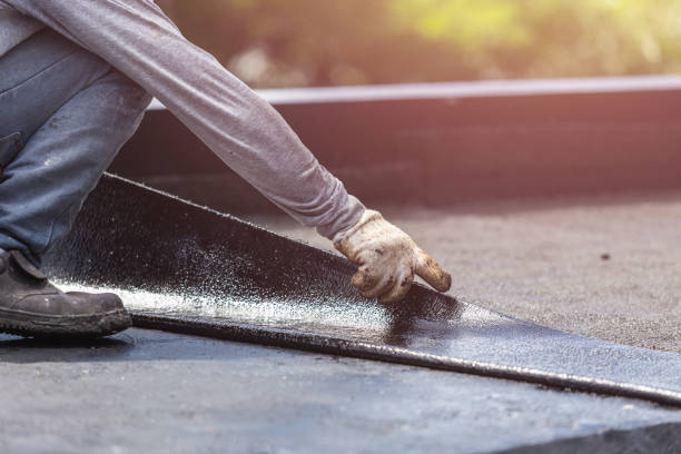 Professional Exterior Waterproofing technician working in Moss, TN